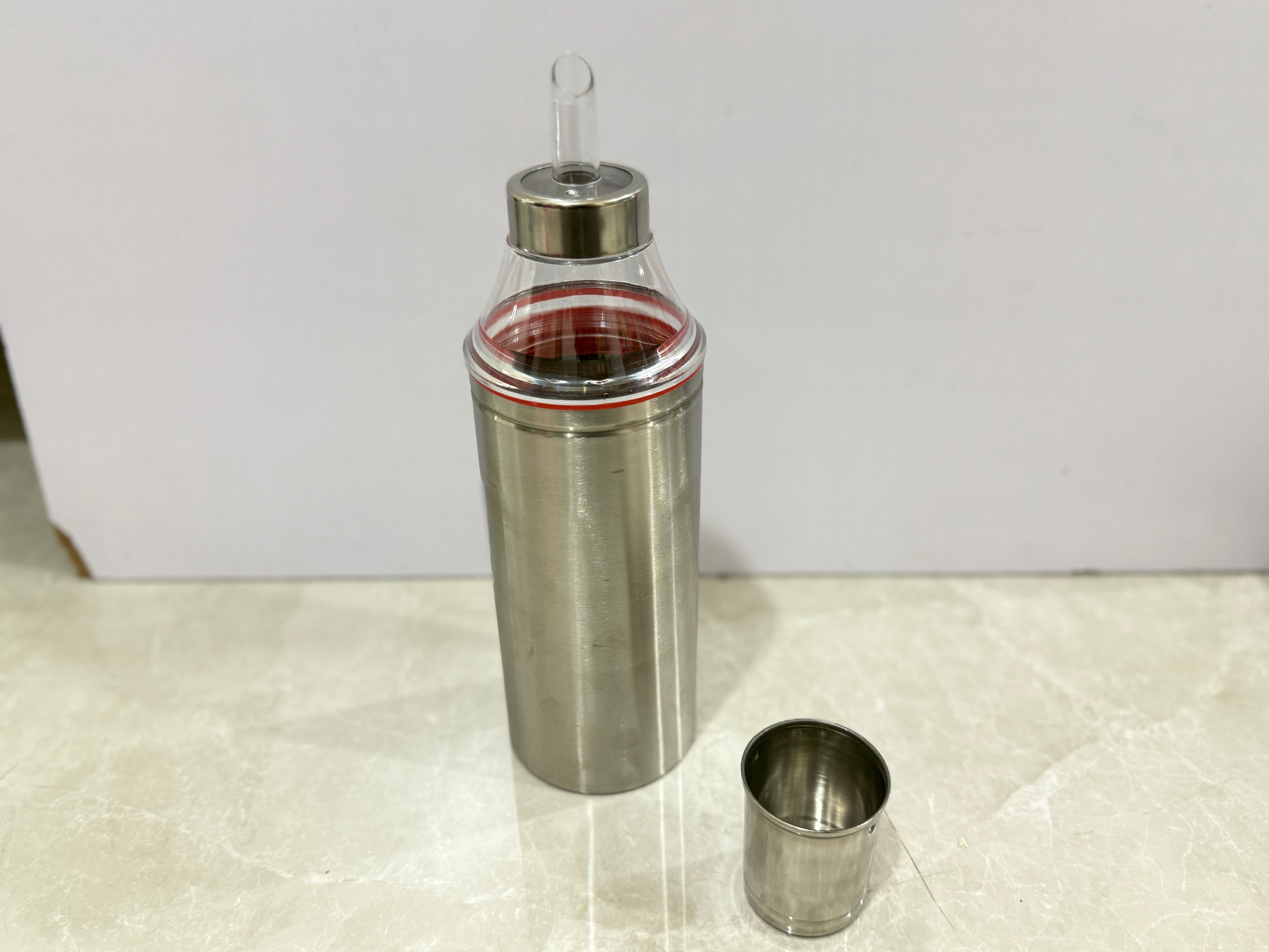 Metallic oil bottle