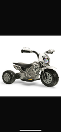 Children's toy motorcycle on a white background