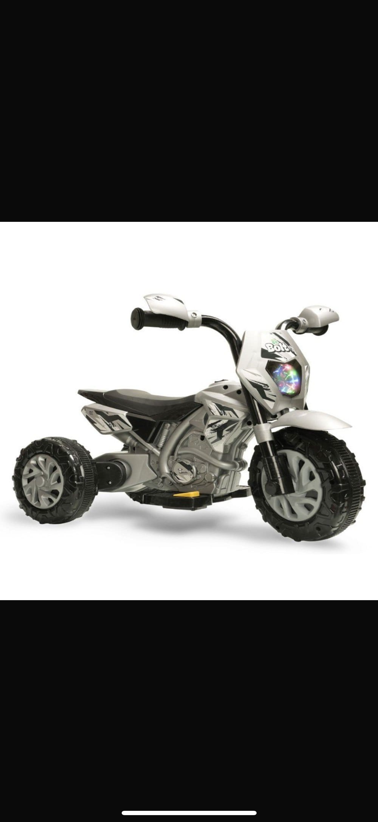 Children's toy motorcycle on a white background